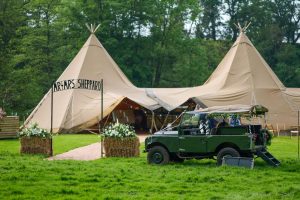 tipi with fire pit, giant hat tipi, glamping tent hire, party tent hire, tipi tent hire