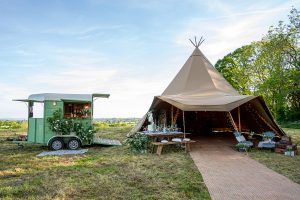 tipi with fire pit, giant hat tipi, glamping tent hire, party tent hire, tipi tent hire